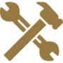Gold icon of crossed hammer and wrench representing services